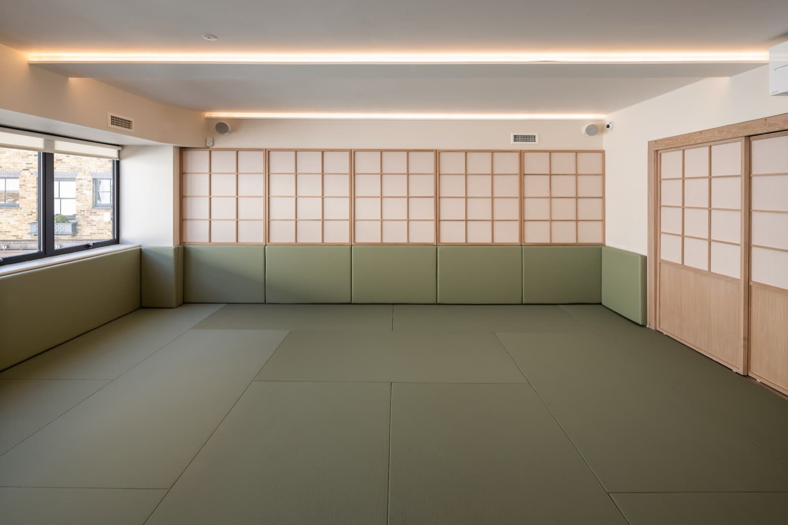 A matted studio floor captured for a fitness virtual tour