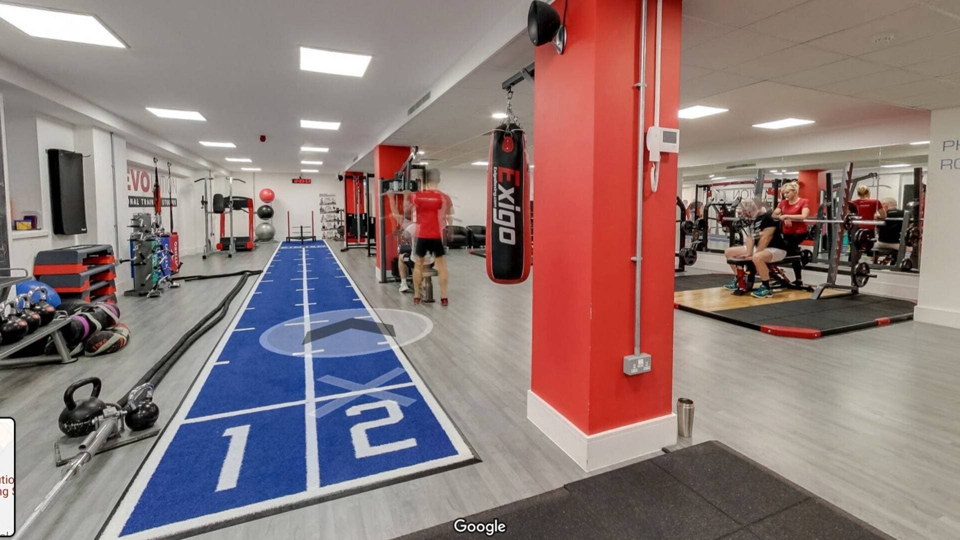 A Google 360 tour of a gym, Street View navigation visible on screen