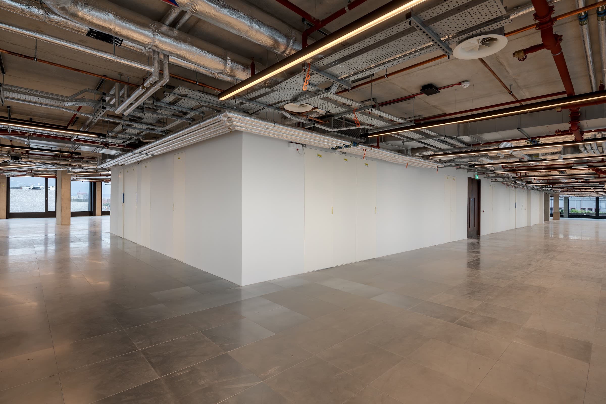 A full office floor stripped back to CAT A, photographed by Biztour