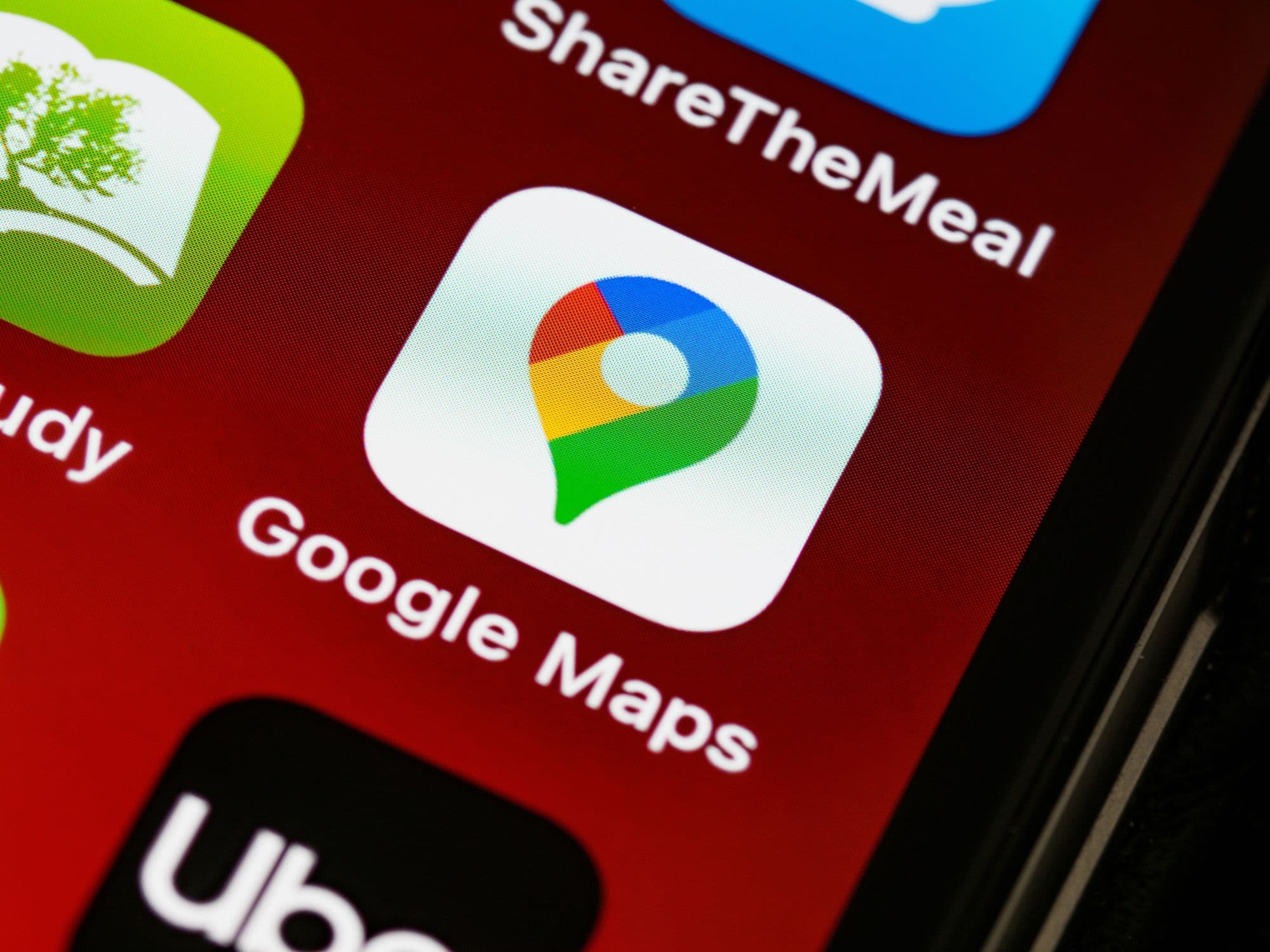 Close-up of the Google Maps app icon on a phone home screen